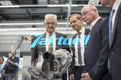 Pressegespräch bei Porsche mit Winfried Kretschmann, (Baustellen-)Rundgang am Porsche-Stammsitz